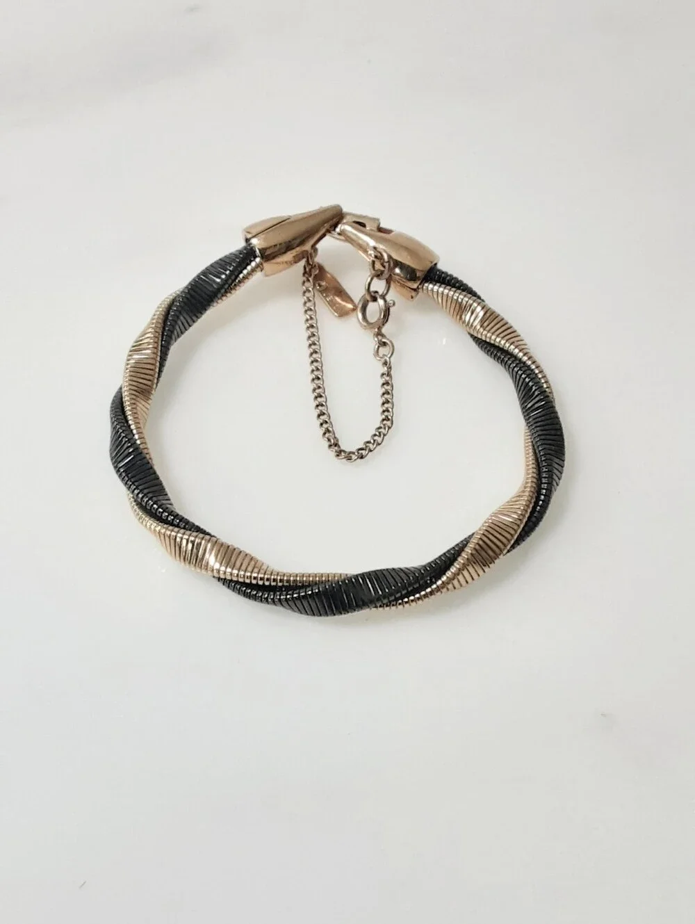 MONET Two-Tone Twisted Black and Gold Cable Bracelet with Safety Chain 7